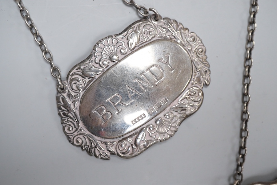 A collection of jewels, comprising: two amber pendants and an amber ring, each mounted in silver; a pair of gilt metal and enamel earrings of floral design; a pair of gilt metal earrings; a silver and cultured brooch; a